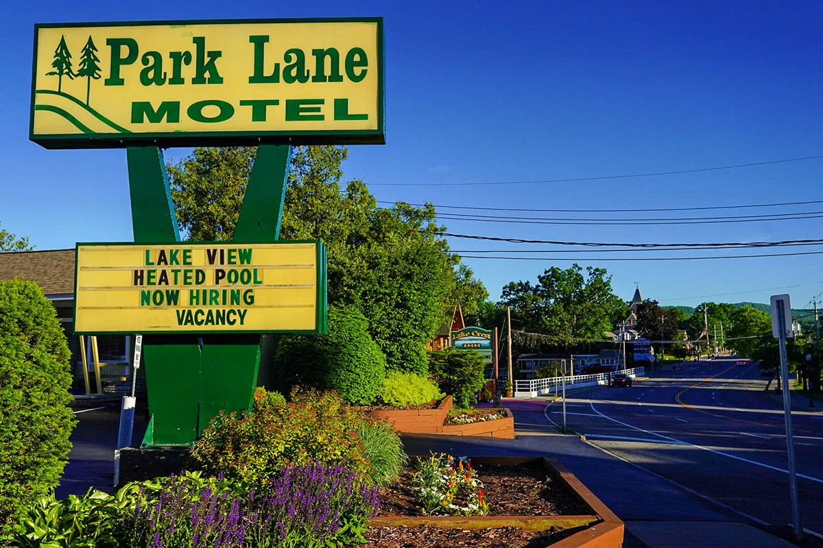 Park Lane Motel front road sign in the middle of Lake George