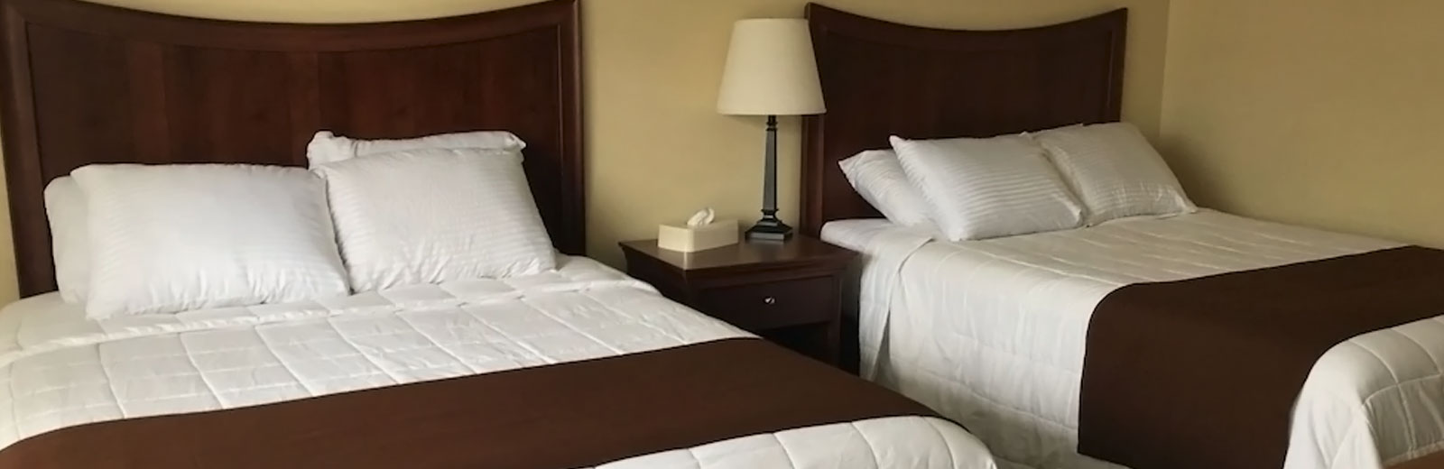 Two queen beds at Park Lane Motel on Lake George